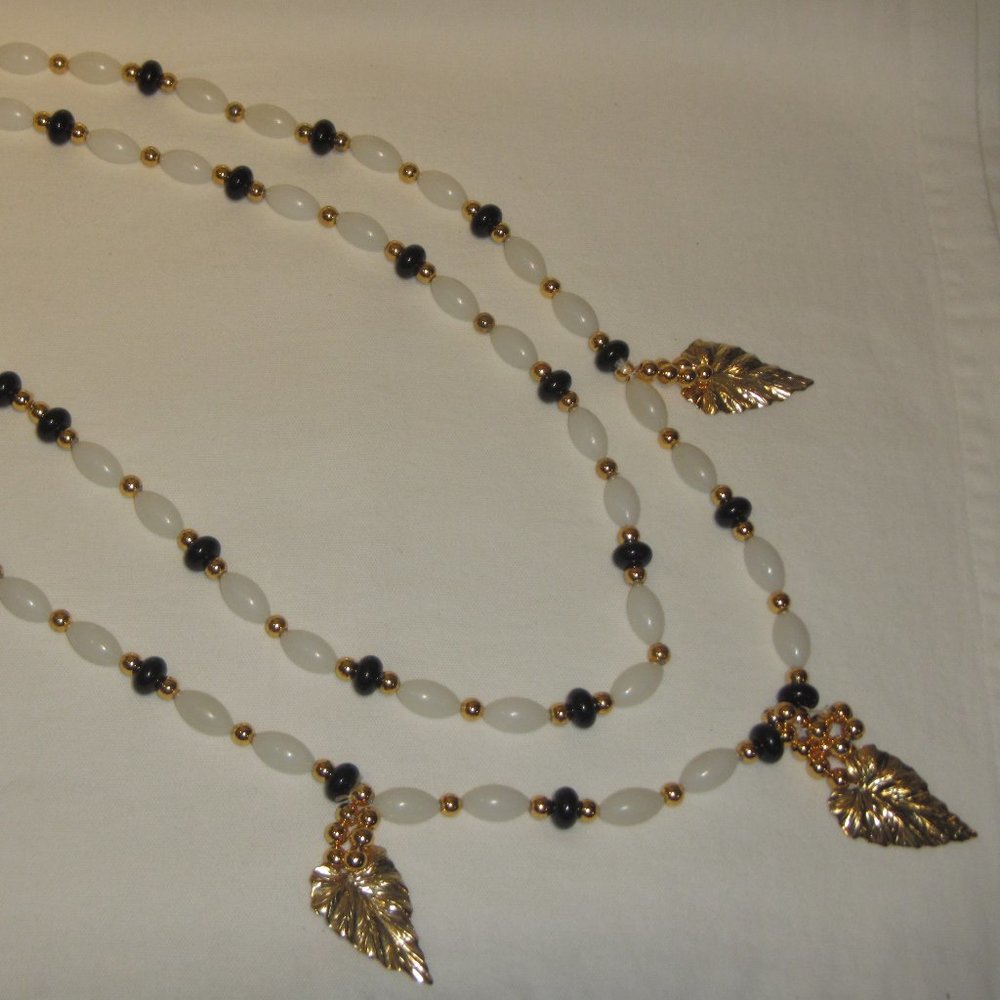 Matching Set of 2 Large Necklaces White Black Beads and Gold Leaves